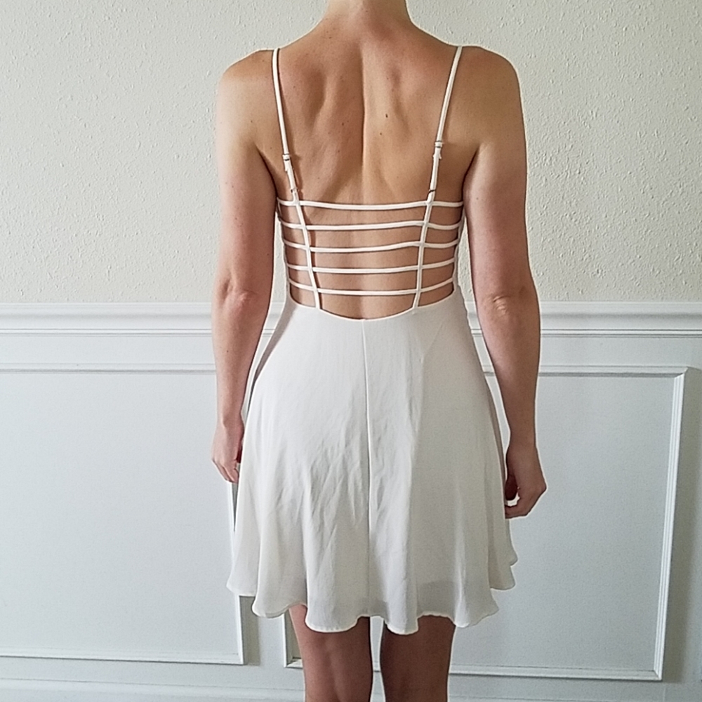 Backless white flowy dress